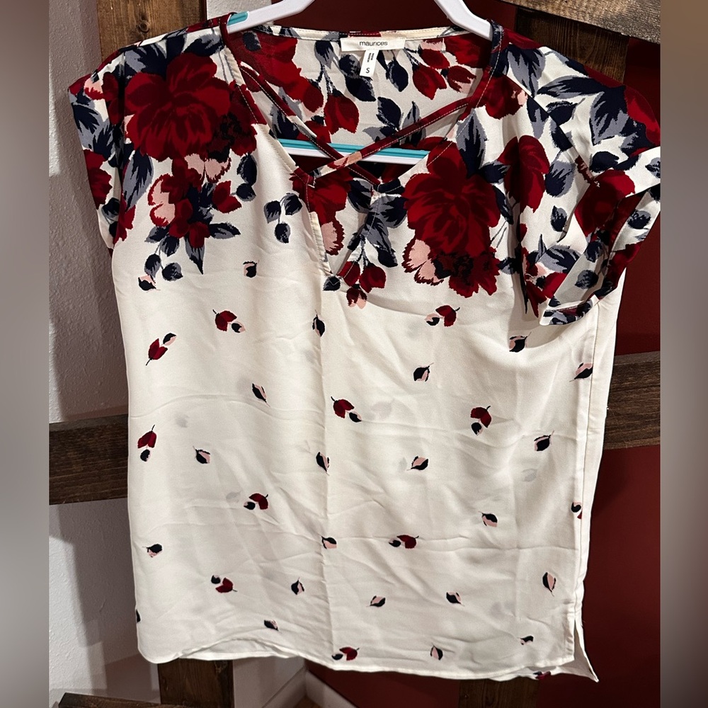 White blouse with red and blue flowers. Size small